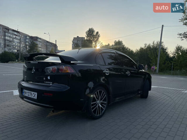 Черный Мицубиси Лансер, объемом двигателя 2.36 л и пробегом 136 тыс. км за 11600 $, фото 7 на Automoto.ua