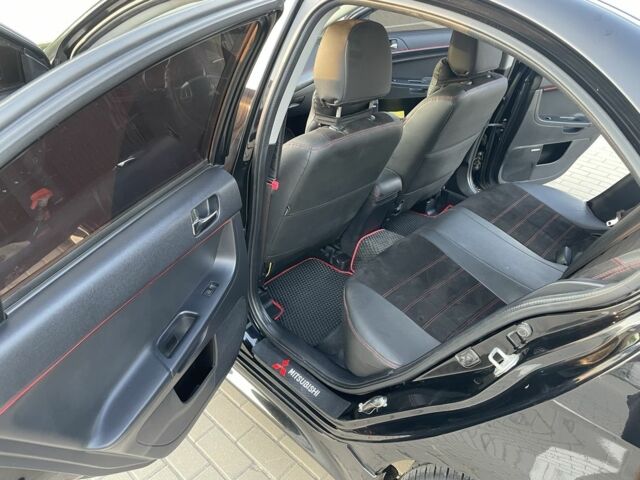 Черный Мицубиси Лансер, объемом двигателя 2.4 л и пробегом 140 тыс. км за 10800 $, фото 16 на Automoto.ua