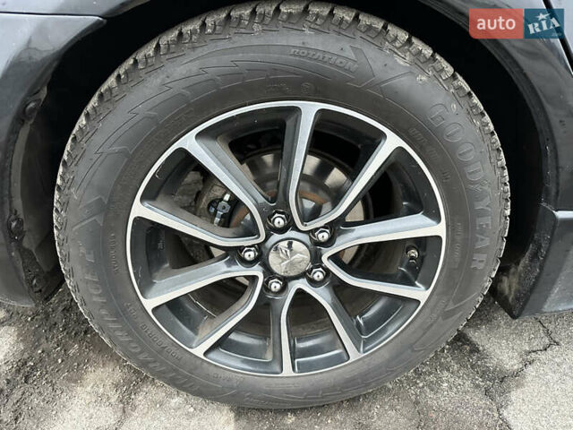 Черный Мицубиси Лансер, объемом двигателя 2 л и пробегом 142 тыс. км за 9500 $, фото 31 на Automoto.ua