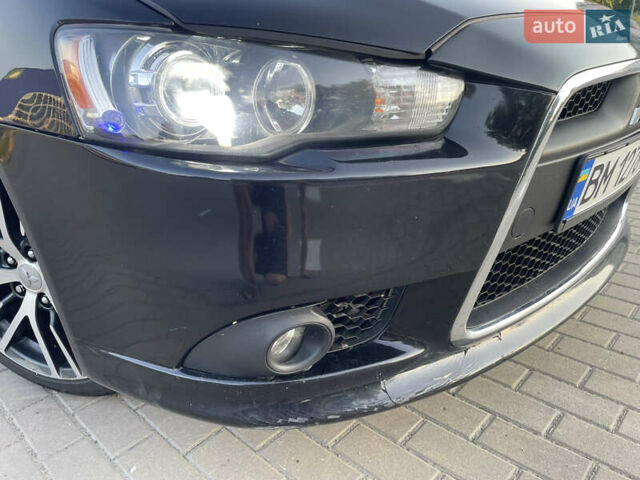 Черный Мицубиси Лансер, объемом двигателя 2.36 л и пробегом 136 тыс. км за 11600 $, фото 10 на Automoto.ua