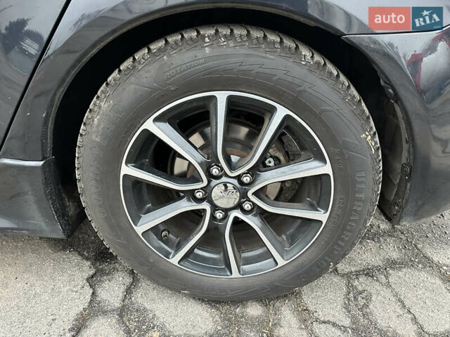 Черный Мицубиси Лансер, объемом двигателя 2 л и пробегом 142 тыс. км за 9500 $, фото 34 на Automoto.ua