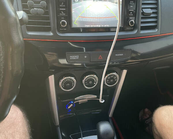 Черный Мицубиси Лансер, объемом двигателя 2.36 л и пробегом 136 тыс. км за 11600 $, фото 16 на Automoto.ua