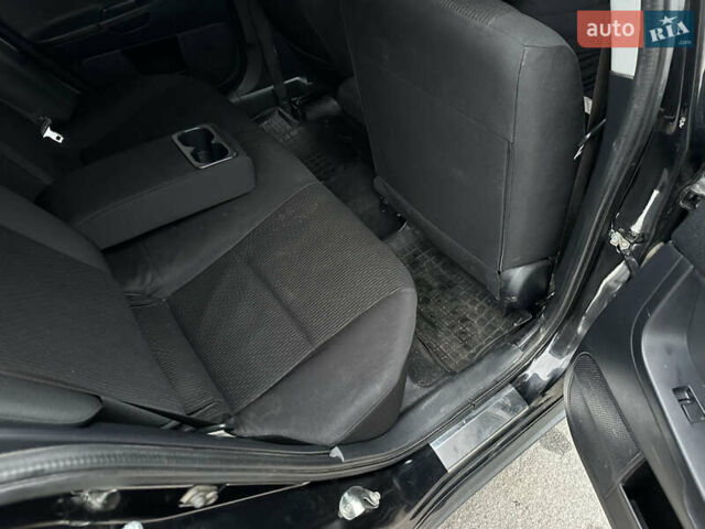 Черный Мицубиси Лансер, объемом двигателя 2 л и пробегом 142 тыс. км за 9500 $, фото 14 на Automoto.ua