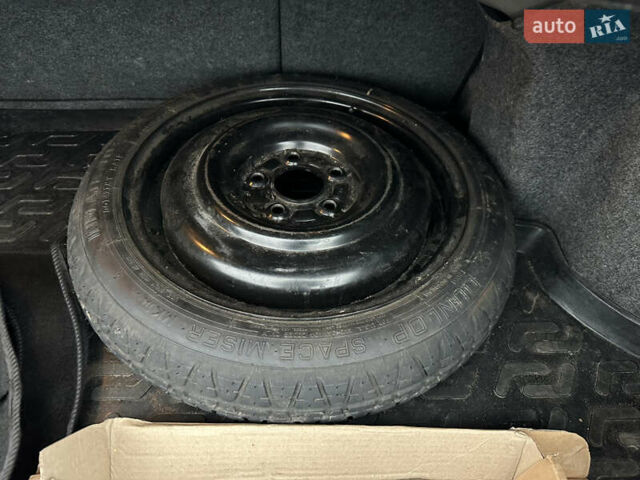 Черный Мицубиси Лансер, объемом двигателя 2 л и пробегом 142 тыс. км за 9500 $, фото 38 на Automoto.ua