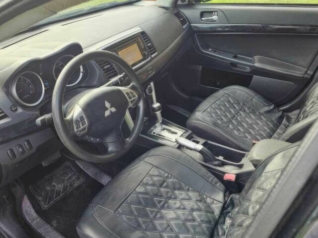 Чорний Міцубісі Lancer, об'ємом двигуна 2 л та пробігом 81 тис. км за 6000 $, фото 5 на Automoto.ua
