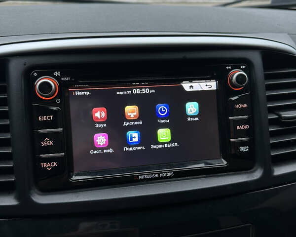 Черный Мицубиси Лансер, объемом двигателя 2 л и пробегом 142 тыс. км за 9500 $, фото 23 на Automoto.ua