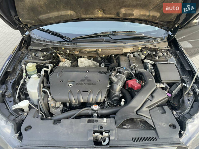 Черный Мицубиси Лансер, объемом двигателя 2.36 л и пробегом 136 тыс. км за 11600 $, фото 12 на Automoto.ua