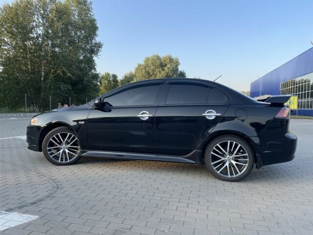 Черный Мицубиси Лансер, объемом двигателя 2.4 л и пробегом 140 тыс. км за 10800 $, фото 6 на Automoto.ua