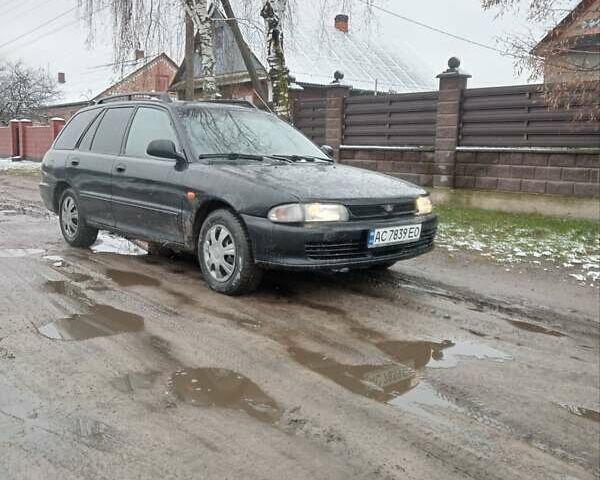 Чорний Міцубісі Lancer, об'ємом двигуна 2 л та пробігом 166 тис. км за 1699 $, фото 2 на Automoto.ua
