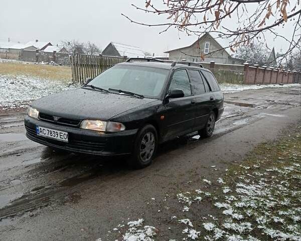 Чорний Міцубісі Lancer, об'ємом двигуна 2 л та пробігом 166 тис. км за 1699 $, фото 4 на Automoto.ua