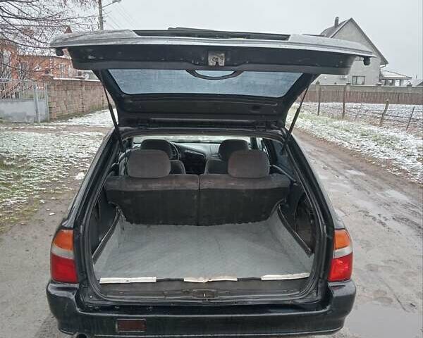 Чорний Міцубісі Lancer, об'ємом двигуна 2 л та пробігом 166 тис. км за 1699 $, фото 7 на Automoto.ua