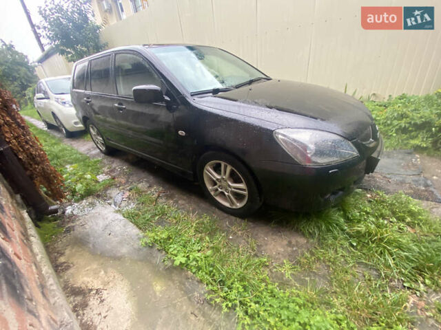 Чорний Міцубісі Lancer, об'ємом двигуна 2 л та пробігом 289 тис. км за 3600 $, фото 7 на Automoto.ua