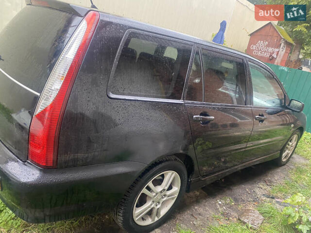 Чорний Міцубісі Lancer, об'ємом двигуна 2 л та пробігом 289 тис. км за 3600 $, фото 5 на Automoto.ua