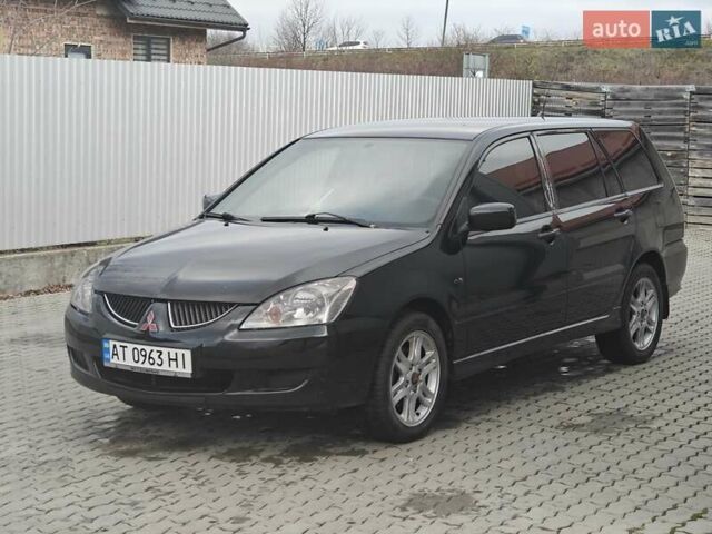 Черный Мицубиси Лансер, объемом двигателя 1.6 л и пробегом 591 тыс. км за 3300 $, фото 9 на Automoto.ua