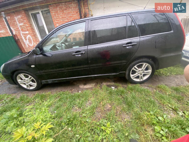 Чорний Міцубісі Lancer, об'ємом двигуна 2 л та пробігом 289 тис. км за 3600 $, фото 3 на Automoto.ua