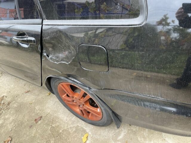 Черный Мицубиси Лансер, объемом двигателя 2 л и пробегом 175 тыс. км за 2850 $, фото 12 на Automoto.ua