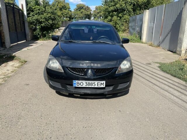 Черный Мицубиси Лансер, объемом двигателя 2 л и пробегом 175 тыс. км за 2850 $, фото 6 на Automoto.ua