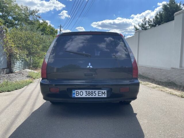 Черный Мицубиси Лансер, объемом двигателя 2 л и пробегом 175 тыс. км за 2850 $, фото 3 на Automoto.ua