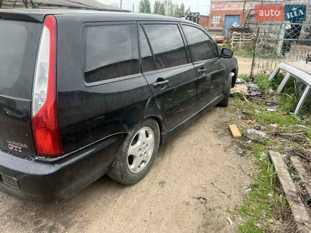 Чорний Міцубісі Lancer, об'ємом двигуна 2 л та пробігом 250 тис. км за 1850 $, фото 3 на Automoto.ua