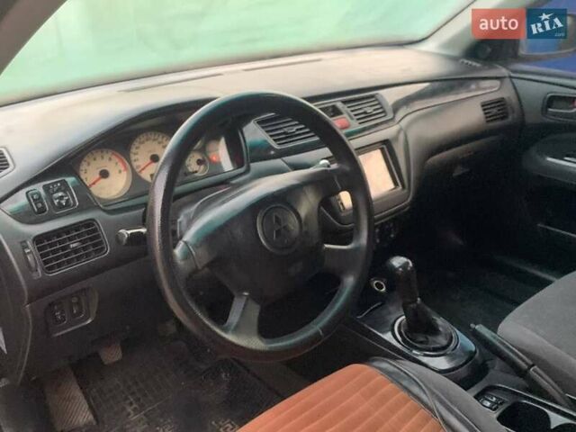Чорний Міцубісі Lancer, об'ємом двигуна 1.6 л та пробігом 121 тис. км за 3900 $, фото 6 на Automoto.ua