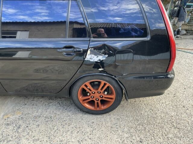 Черный Мицубиси Лансер, объемом двигателя 2 л и пробегом 175 тыс. км за 2850 $, фото 8 на Automoto.ua