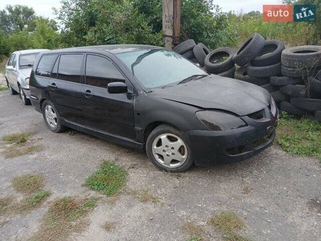 Чорний Міцубісі Lancer, об'ємом двигуна 2 л та пробігом 250 тис. км за 1850 $, фото 4 на Automoto.ua