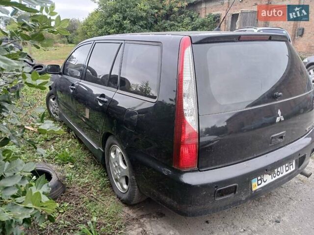 Чорний Міцубісі Lancer, об'ємом двигуна 2 л та пробігом 250 тис. км за 1850 $, фото 5 на Automoto.ua