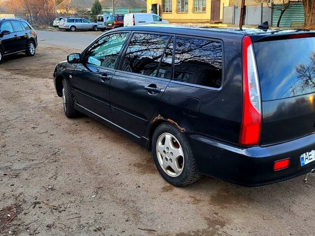 Чорний Міцубісі Lancer, об'ємом двигуна 1.6 л та пробігом 290 тис. км за 1999 $, фото 5 на Automoto.ua