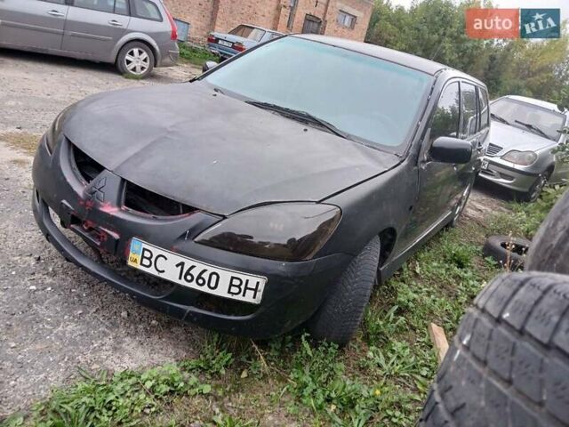 Чорний Міцубісі Lancer, об'ємом двигуна 2 л та пробігом 250 тис. км за 1850 $, фото 7 на Automoto.ua