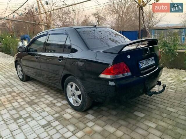 Чорний Міцубісі Lancer, об'ємом двигуна 1.6 л та пробігом 121 тис. км за 3900 $, фото 2 на Automoto.ua