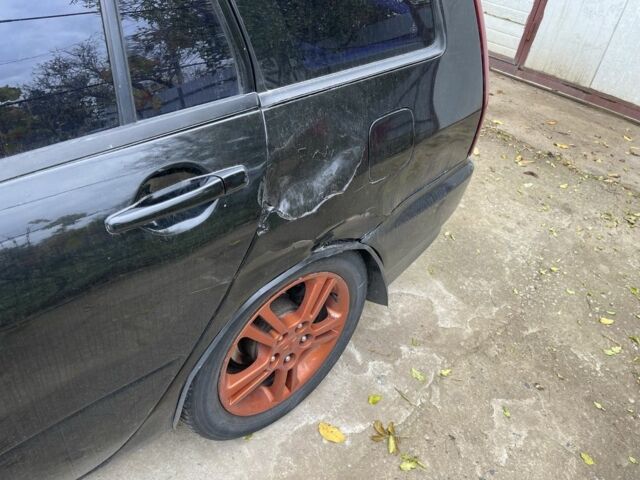 Черный Мицубиси Лансер, объемом двигателя 2 л и пробегом 175 тыс. км за 2850 $, фото 10 на Automoto.ua