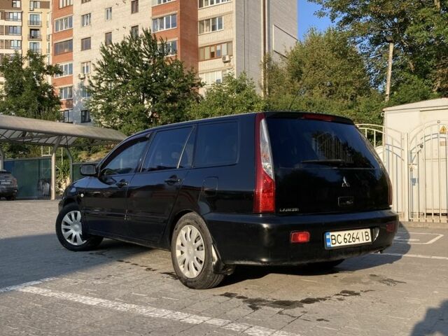 Чорний Міцубісі Lancer, об'ємом двигуна 1.6 л та пробігом 460 тис. км за 2349 $, фото 2 на Automoto.ua