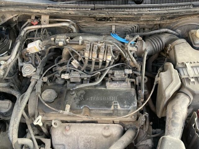 Чорний Міцубісі Lancer, об'ємом двигуна 1.6 л та пробігом 460 тис. км за 2349 $, фото 17 на Automoto.ua
