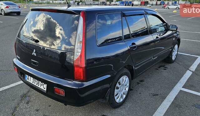 Міцубісі Lancer 2005 у Києві на Automoto.ua Чорний Міцубісі Lancer, об'ємом двигуна 1.6 л та пробігом 245 тис. км за 4000 $, фото 3 на Automoto.ua