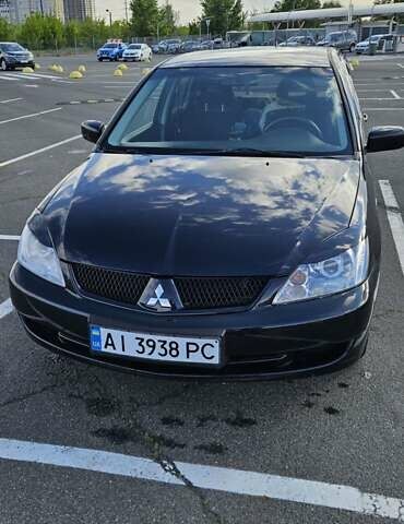 Міцубісі Lancer 2005 у Києві на Automoto.ua Чорний Міцубісі Lancer, об'ємом двигуна 1.6 л та пробігом 245 тис. км за 4000 $, фото 4 на Automoto.ua