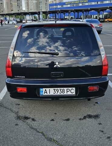 Міцубісі Lancer 2005 у Києві на Automoto.ua Чорний Міцубісі Lancer, об'ємом двигуна 1.6 л та пробігом 245 тис. км за 4000 $, фото 2 на Automoto.ua