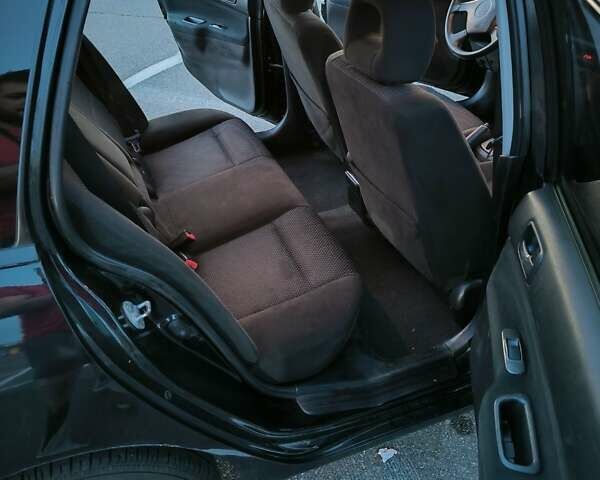 Міцубісі Lancer 2005 у Києві на Automoto.ua Чорний Міцубісі Lancer, об'ємом двигуна 1.6 л та пробігом 245 тис. км за 4000 $, фото 10 на Automoto.ua
