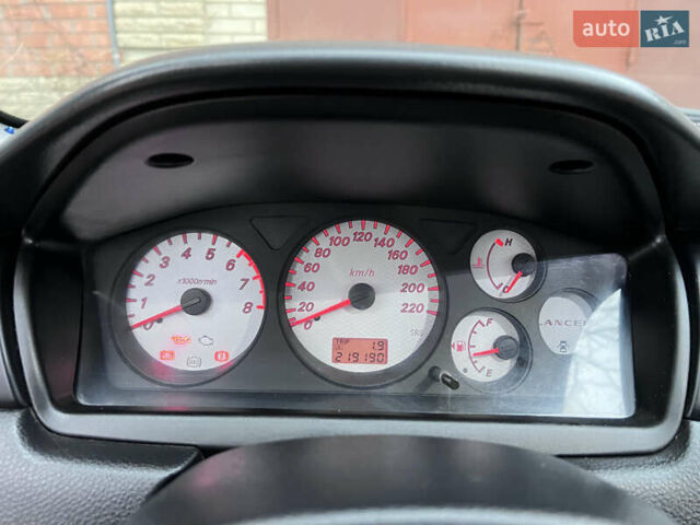 Чорний Міцубісі Lancer, об'ємом двигуна 1.6 л та пробігом 220 тис. км за 5500 $, фото 6 на Automoto.ua