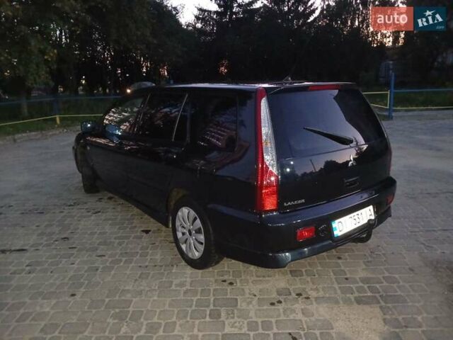 Чорний Міцубісі Lancer, об'ємом двигуна 0 л та пробігом 334 тис. км за 4300 $, фото 7 на Automoto.ua