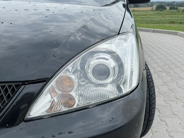 Чорний Міцубісі Lancer, об'ємом двигуна 1.6 л та пробігом 340 тис. км за 3500 $, фото 4 на Automoto.ua