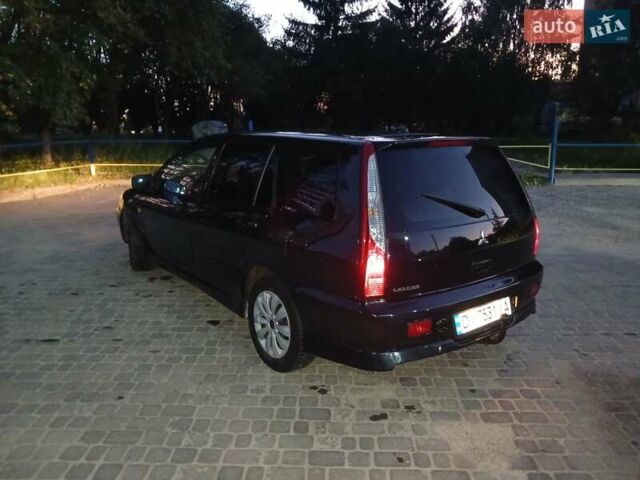 Чорний Міцубісі Lancer, об'ємом двигуна 0 л та пробігом 334 тис. км за 4300 $, фото 23 на Automoto.ua