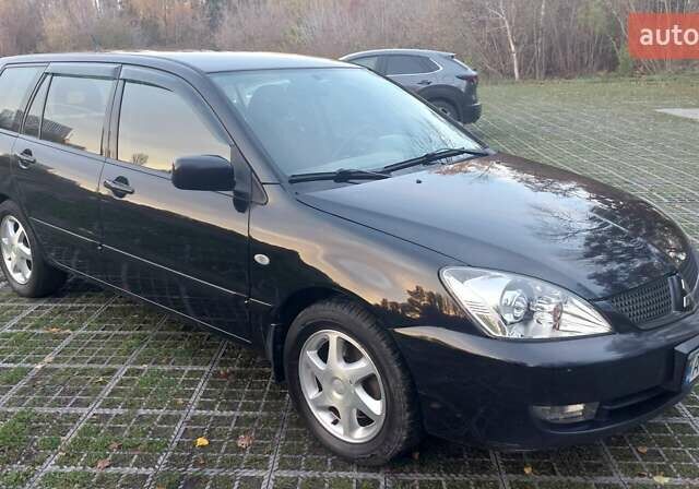Мицубиси Лансер 2006 в Киеве на Automoto.ua Черный Мицубиси Лансер, объемом двигателя 1.58 л и пробегом 296 тыс. км за 4500 $, фото 10 на Automoto.ua