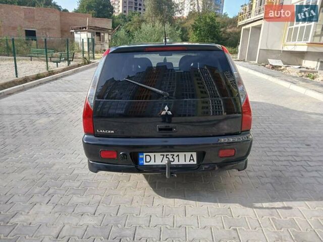Чорний Міцубісі Lancer, об'ємом двигуна 0 л та пробігом 334 тис. км за 4300 $, фото 13 на Automoto.ua