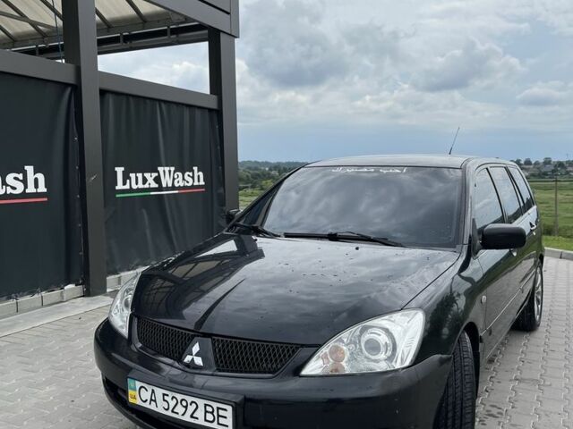 Чорний Міцубісі Lancer, об'ємом двигуна 1.6 л та пробігом 340 тис. км за 3500 $, фото 1 на Automoto.ua