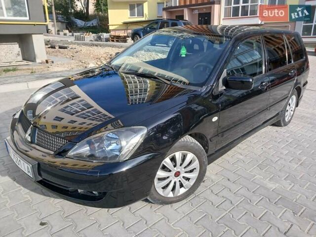 Чорний Міцубісі Lancer, об'ємом двигуна 0 л та пробігом 334 тис. км за 4300 $, фото 19 на Automoto.ua