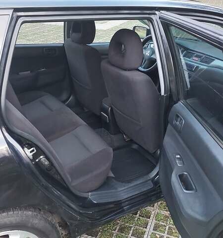 Мицубиси Лансер 2006 в Киеве на Automoto.ua Черный Мицубиси Лансер, объемом двигателя 1.58 л и пробегом 296 тыс. км за 4500 $, фото 18 на Automoto.ua