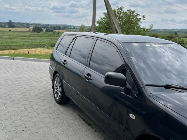 Чорний Міцубісі Lancer, об'ємом двигуна 1.6 л та пробігом 340 тис. км за 3500 $, фото 5 на Automoto.ua