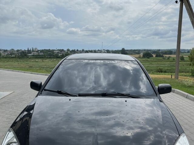 Чорний Міцубісі Lancer, об'ємом двигуна 1.6 л та пробігом 340 тис. км за 3500 $, фото 15 на Automoto.ua