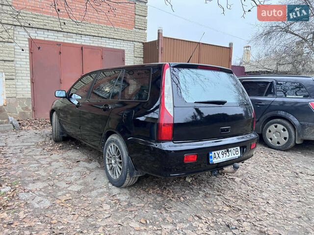 Чорний Міцубісі Lancer, об'ємом двигуна 1.6 л та пробігом 220 тис. км за 5500 $, фото 4 на Automoto.ua