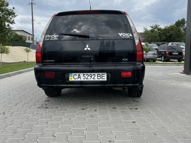 Чорний Міцубісі Lancer, об'ємом двигуна 1.6 л та пробігом 340 тис. км за 3500 $, фото 9 на Automoto.ua